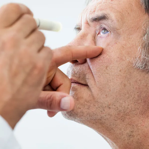 What are the common symptoms of a retinal disease?