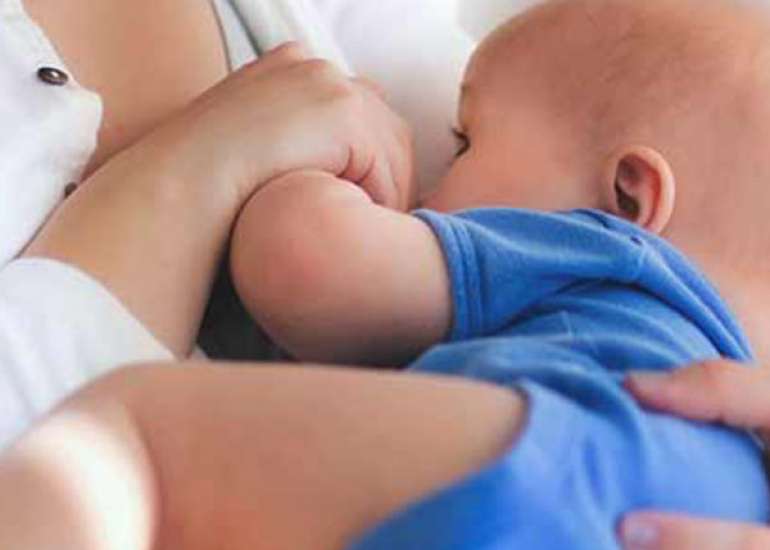 My baby doesn’t latch on to my breast because he can’t breathe. What can I do?