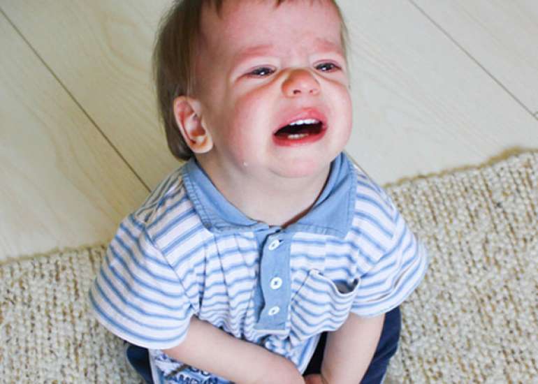 What are the symptoms of UTI in children?