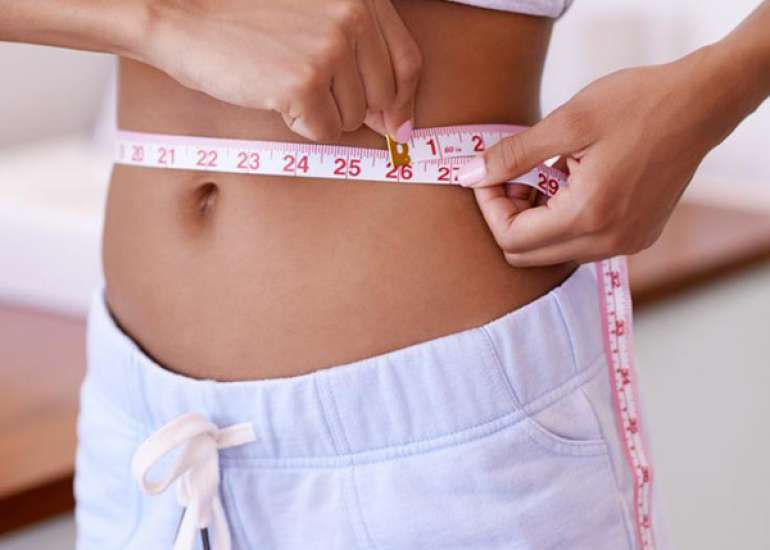 What is the importance of a persons waist to hip ratio?