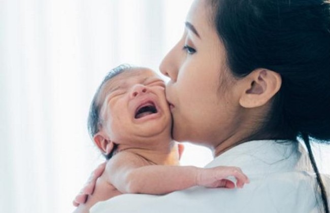 If my child becomes very cranky because of a nasal allergy, how can I help him cope with the nose block and discomfort?