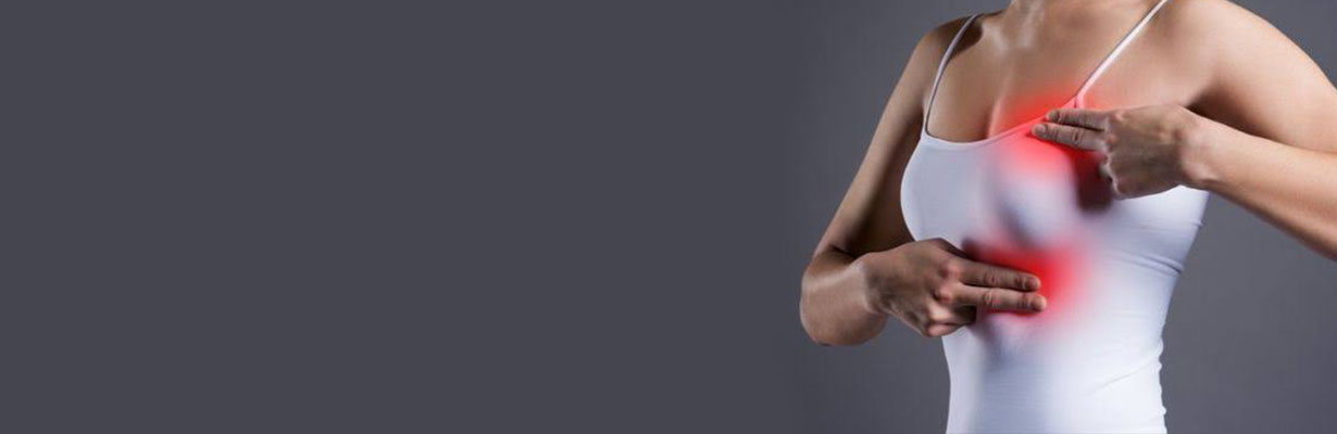 What are the symptoms of Breast Cancer?