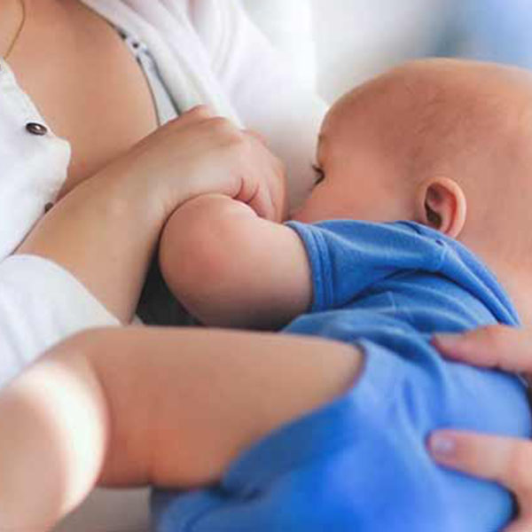 My baby doesn’t latch on to my breast because he can’t breathe. What can I do?