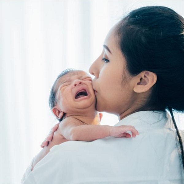 If my child becomes very cranky because of a nasal allergy, how can I help him cope with the nose block and discomfort?
